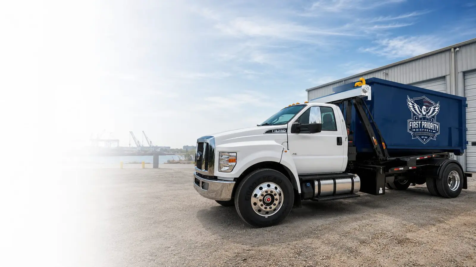 First Priority Disposal dumpster rental truck serving Chesapeake Virginia